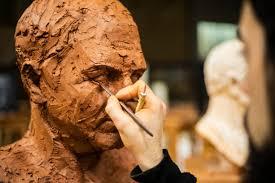 Person working on a sculpture